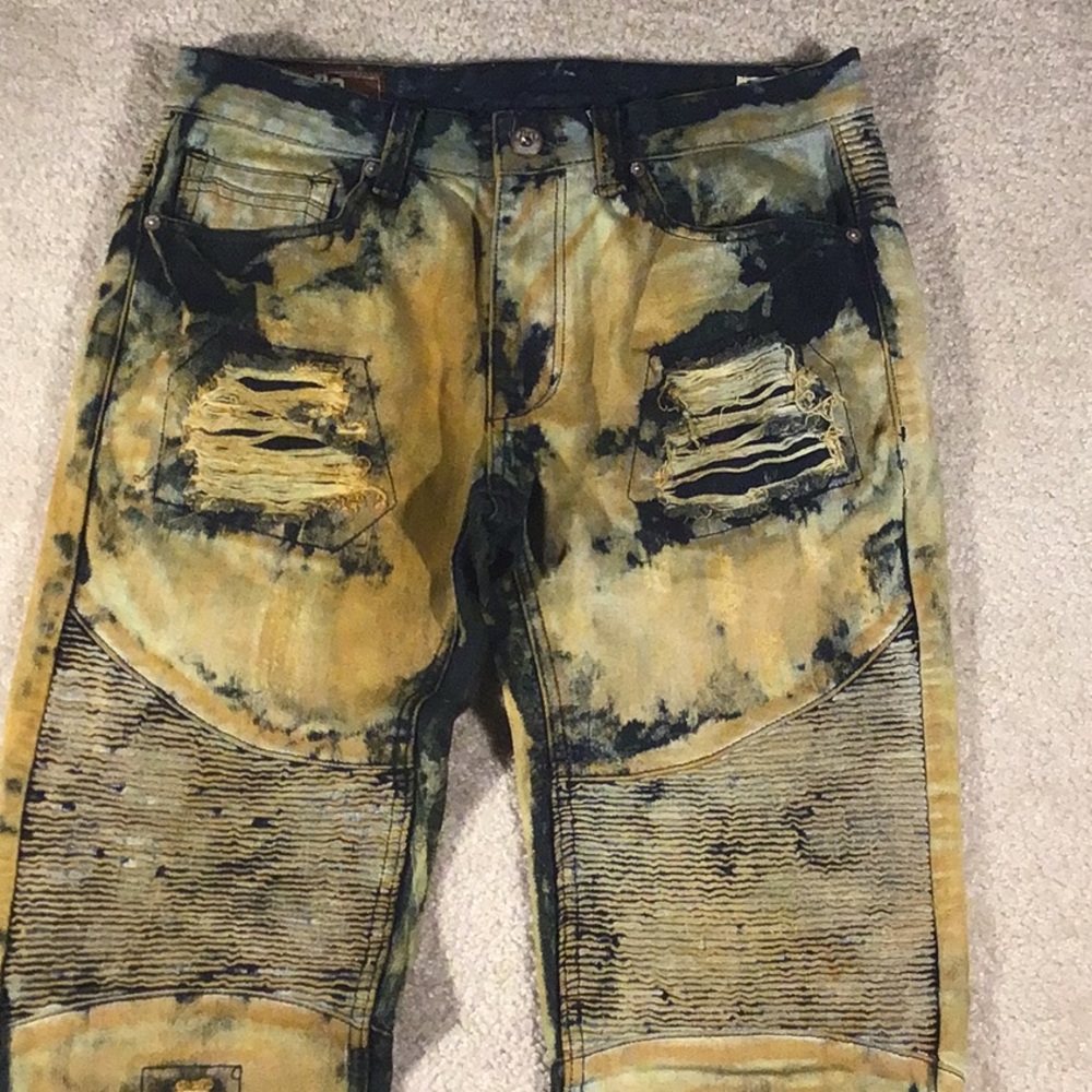 Artistically Distressed jeans by American Legacy